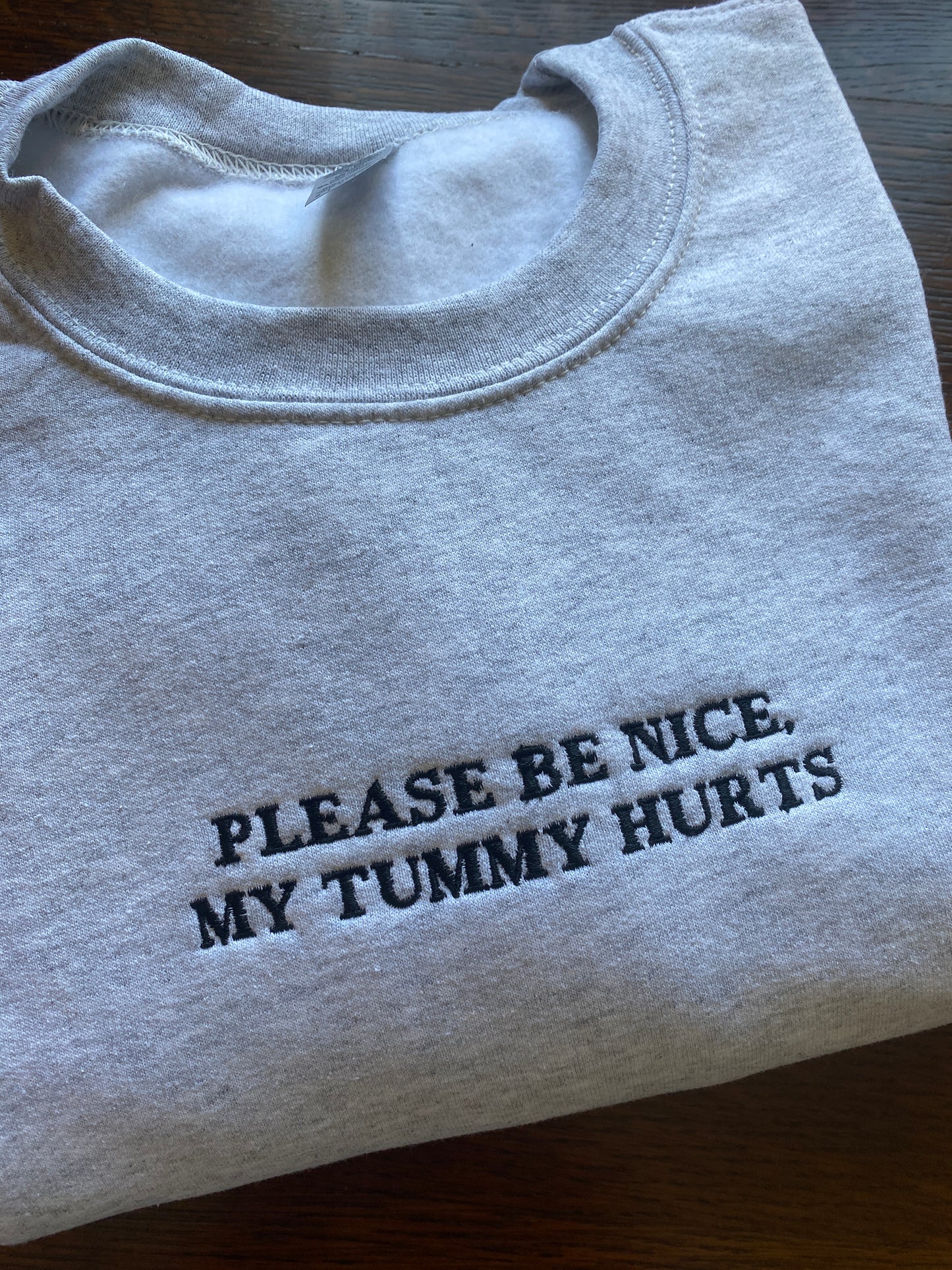 Please be nice my tummy hurts Embroidered Sweatshirt